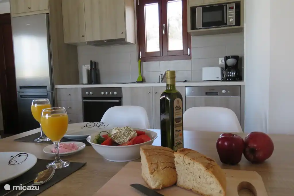 In lengte verstelbare eettafel