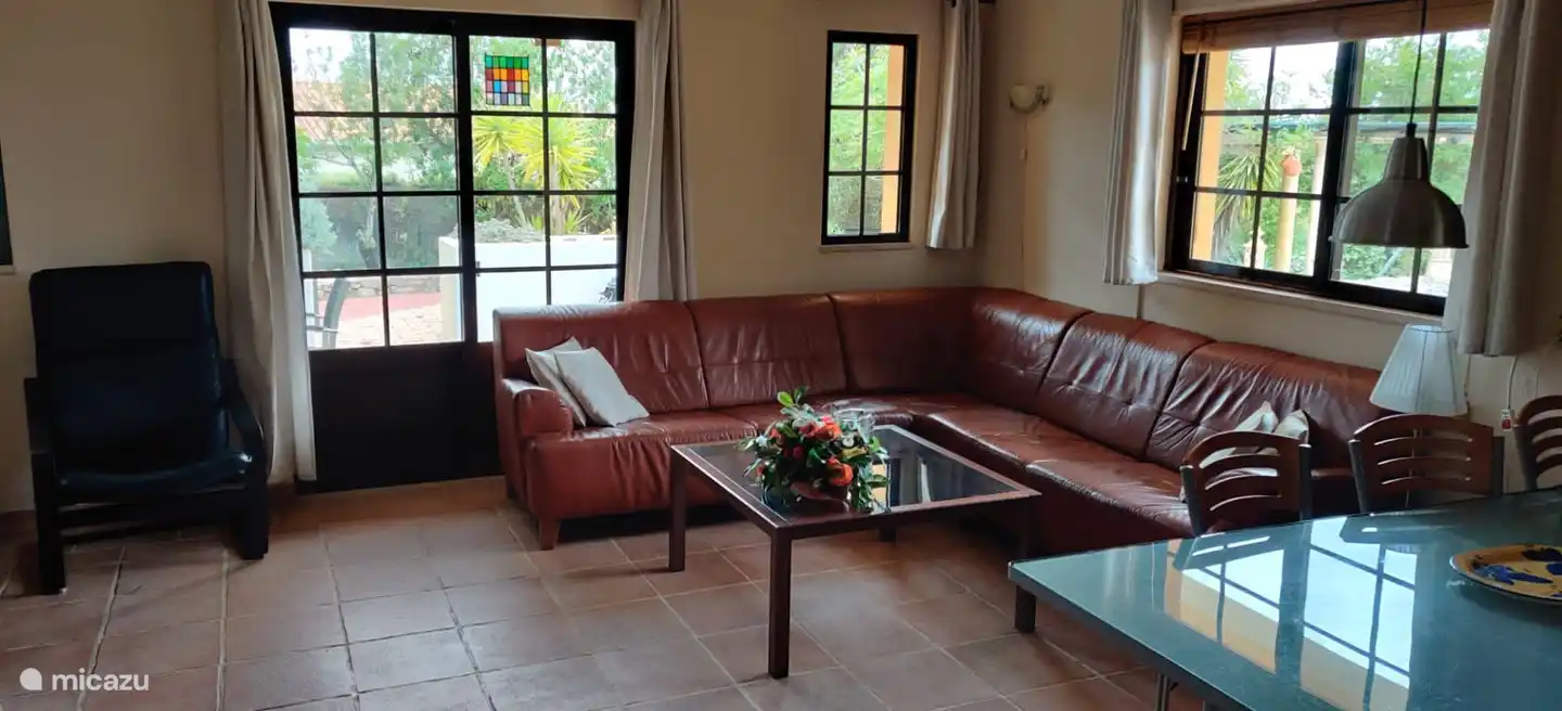 Living room with spacious corner sofa