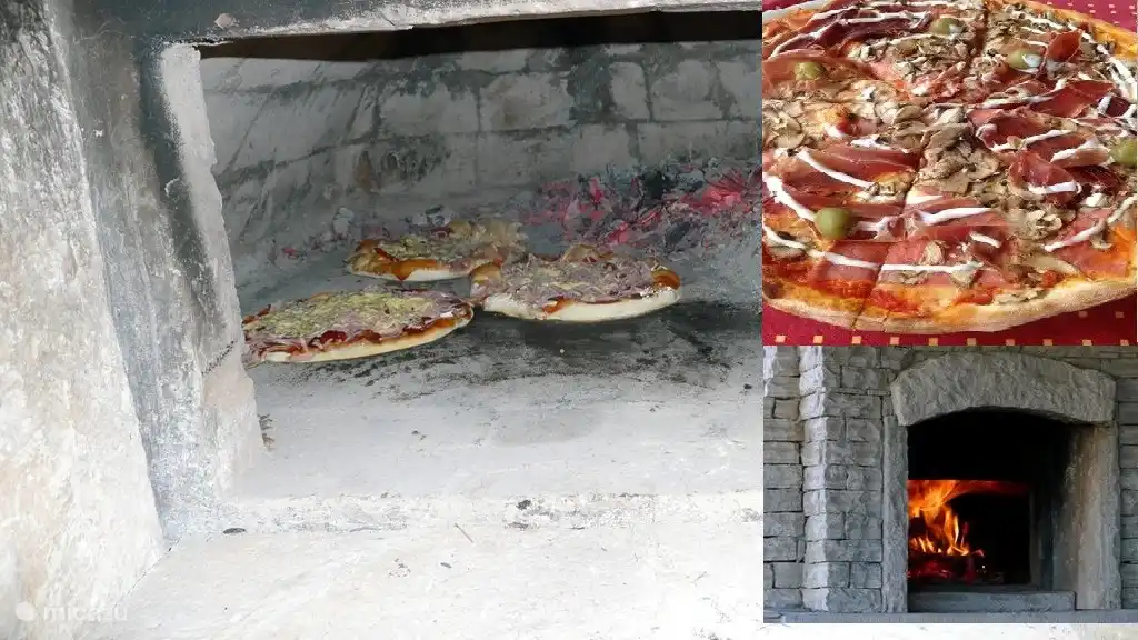Para los amantes de la pizza tenemos un horno de leña empotrado. También es ideal para hornear pan fresco.