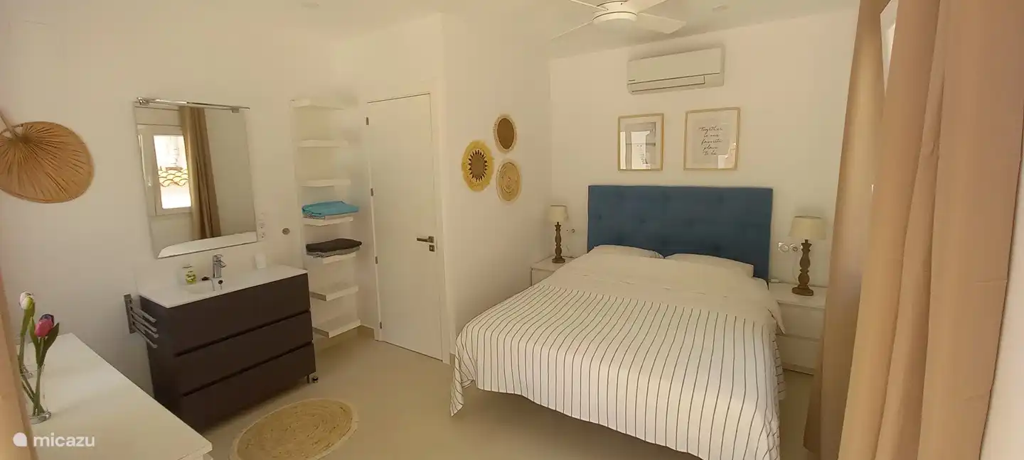 Bedroom 3 with air conditioning, shower, toilet and sink