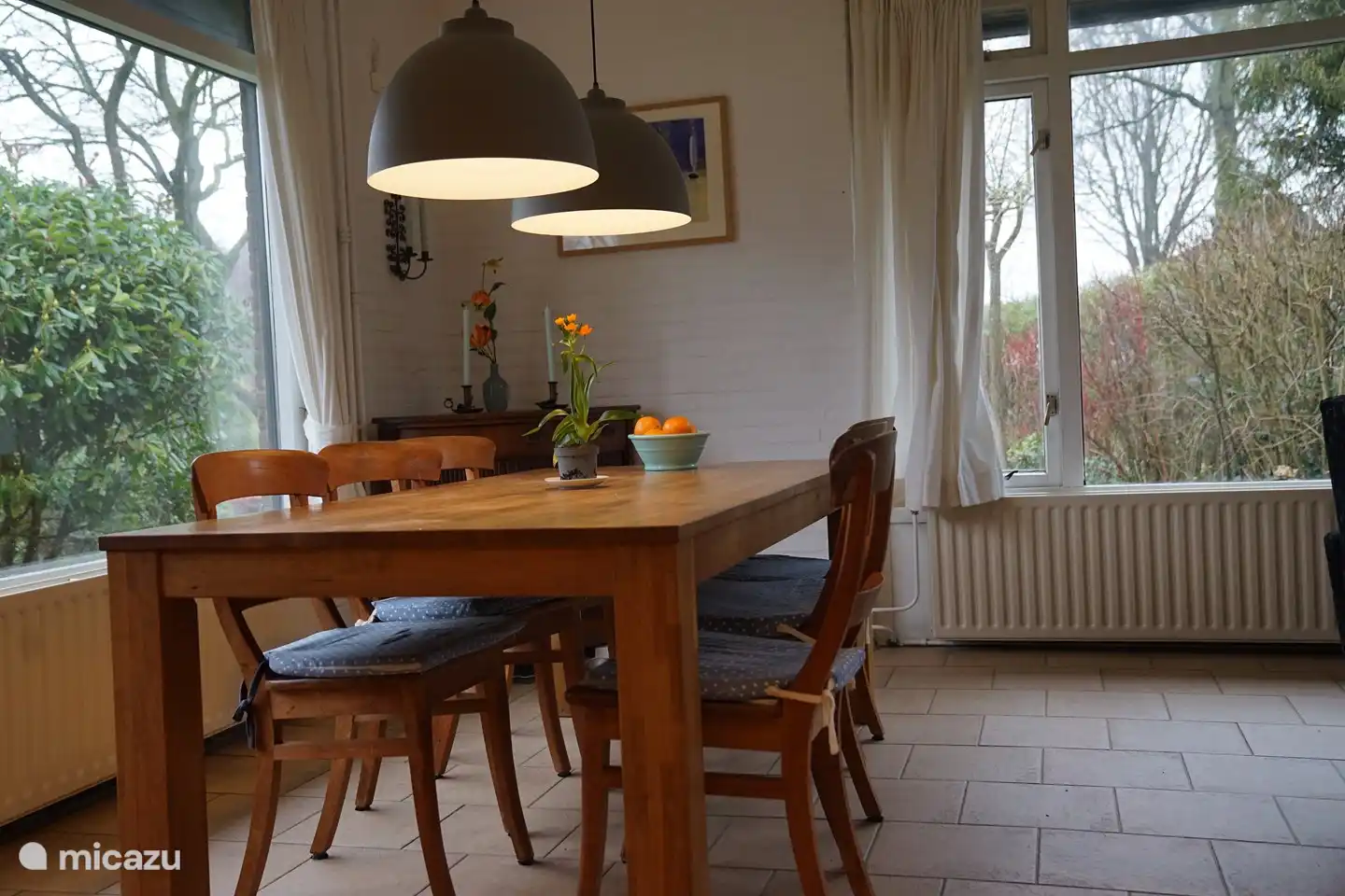 At the dining table it is always pleasant to eat or play games when the weather is not so nice.