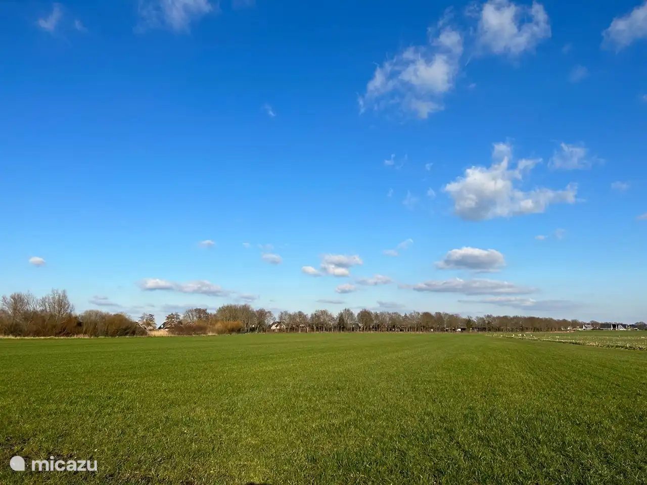 View from the walking path on the front of our house, which lies behind the edge of the forest. This way you can clearly see what a wide view you have from the front of our house, but from the other side