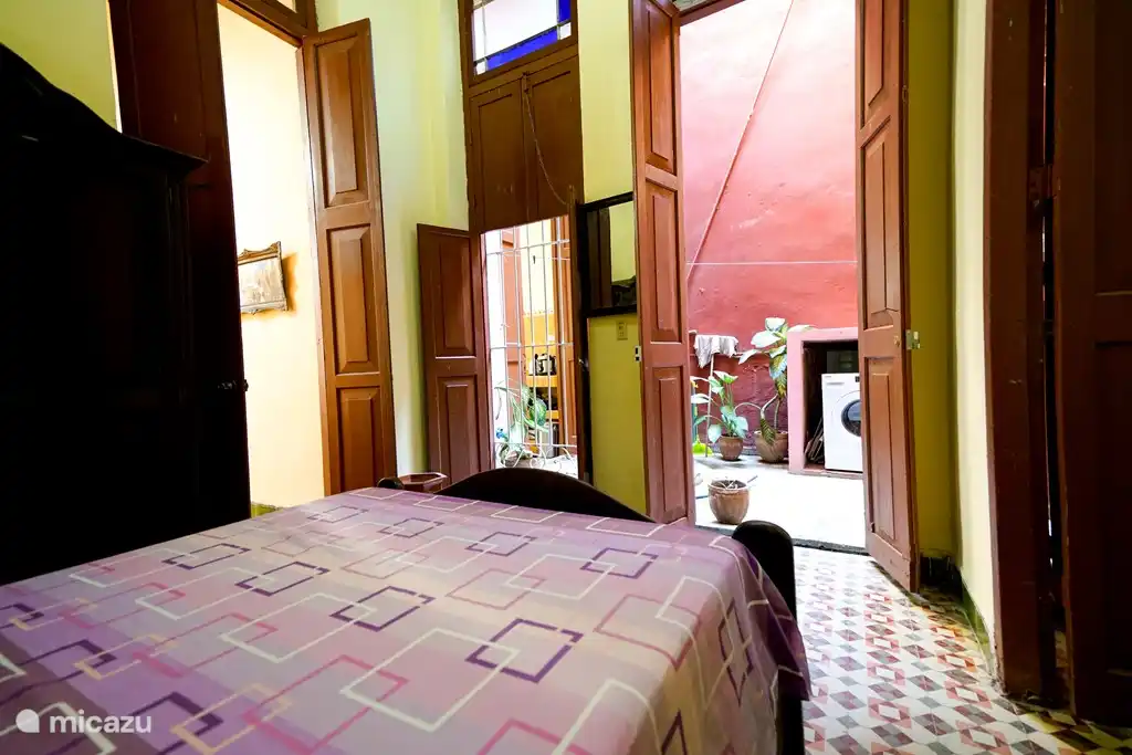 First bedroom with patio