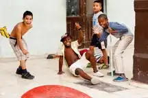 Youth playing in the street