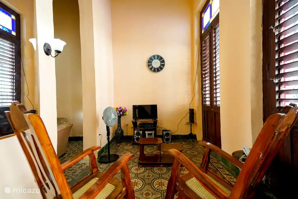 First lounge with patio doors to the street.