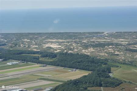 Luchtfoto's richting strand
