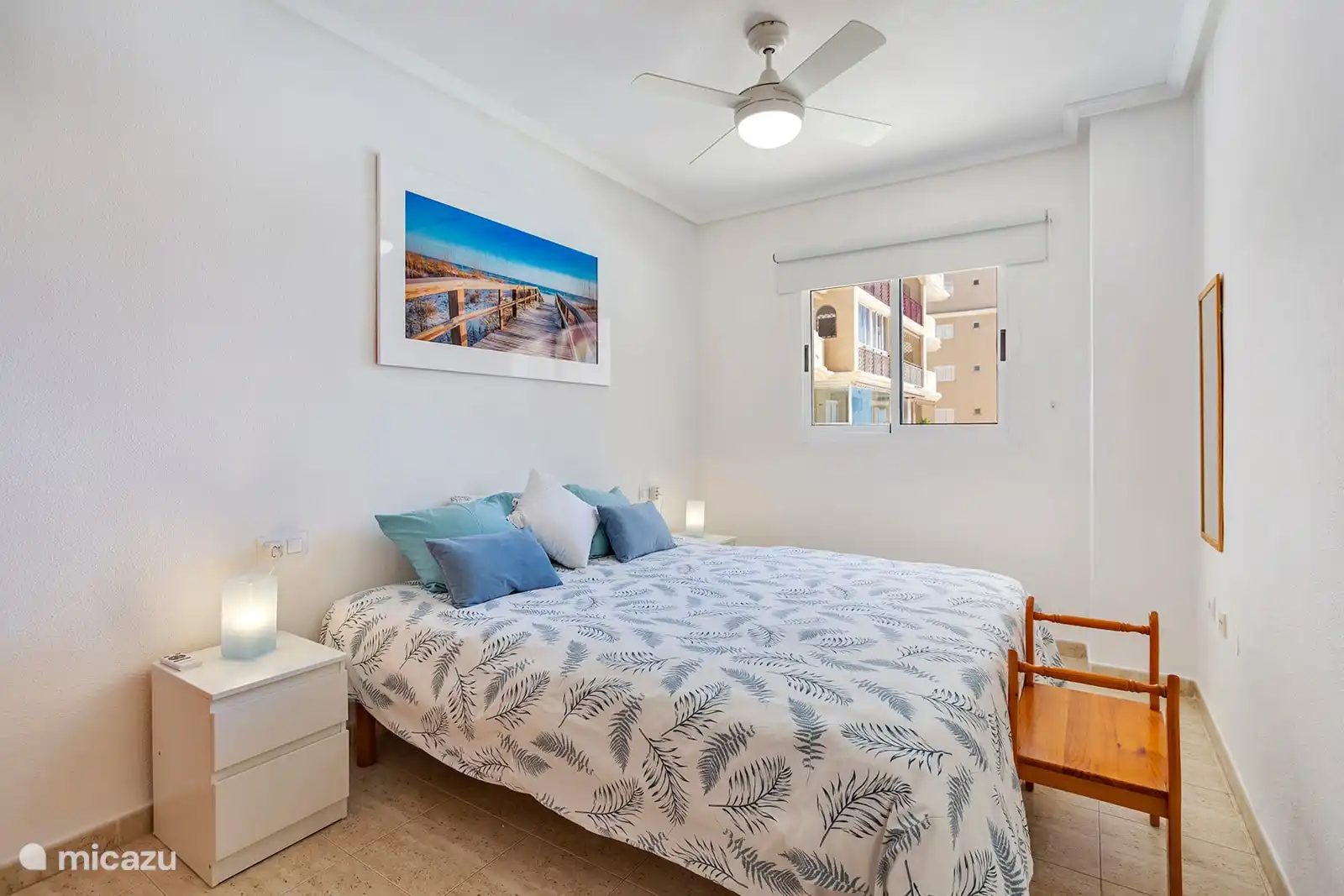 The master bedroom with a king size bed.