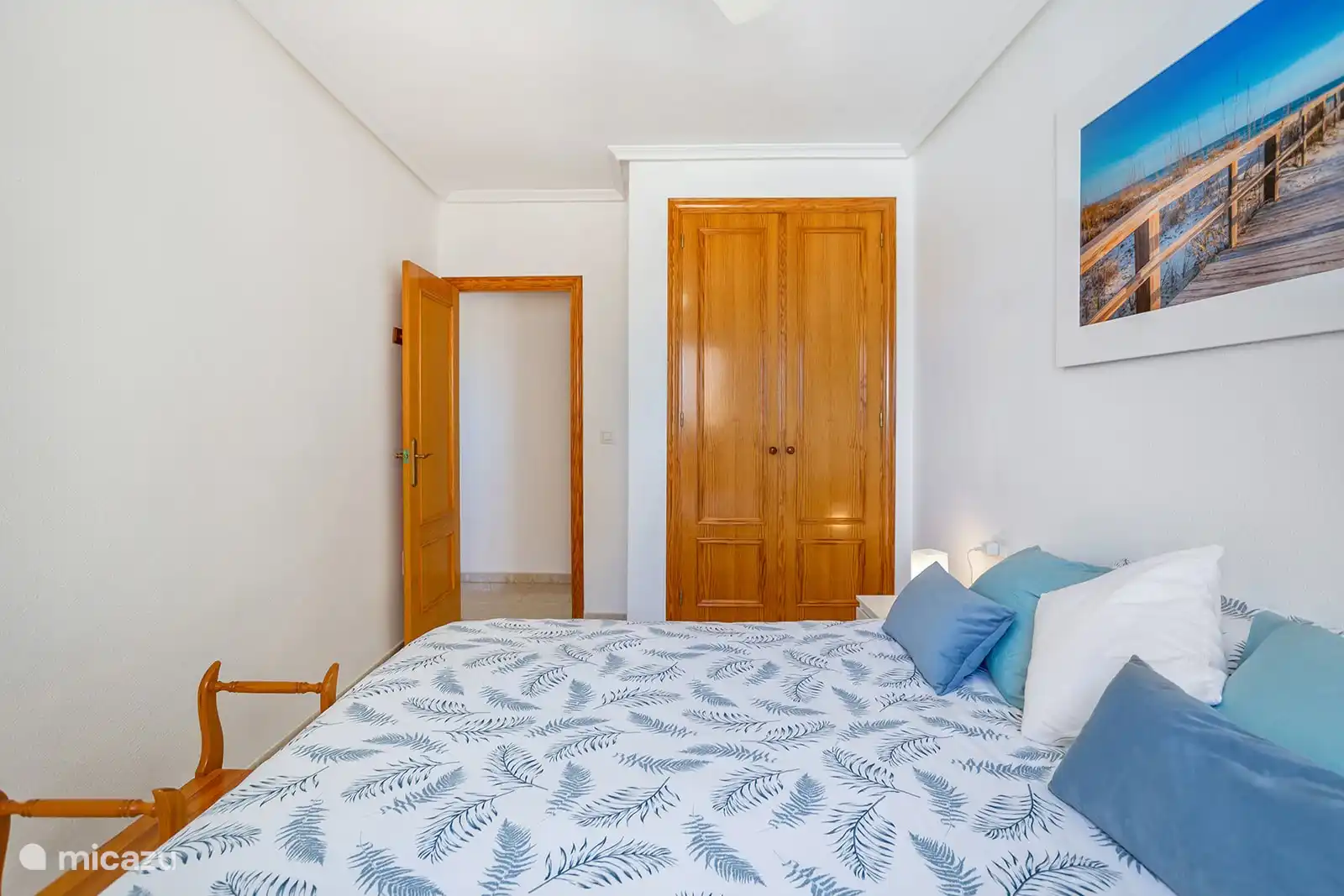 A spacious built-in cupboard.