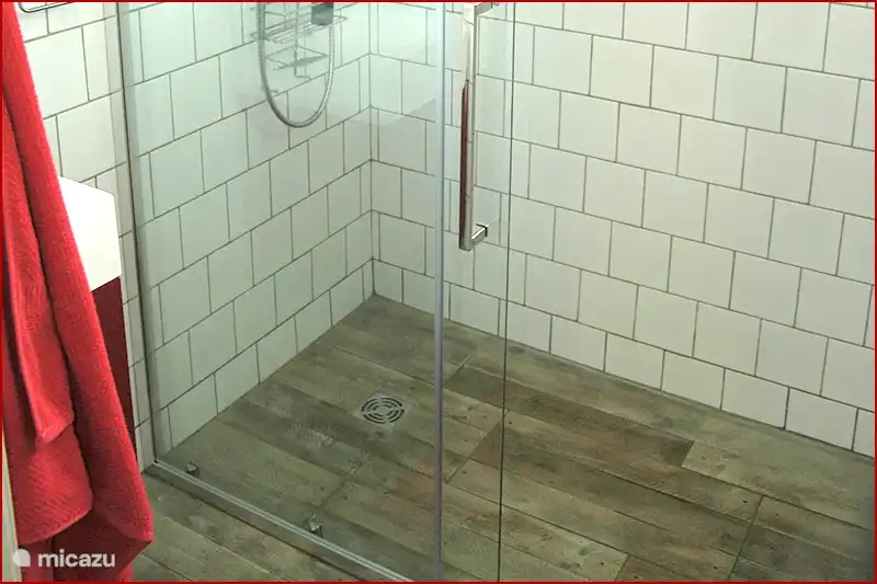 The bathroom, beautiful and easy to keep clean.