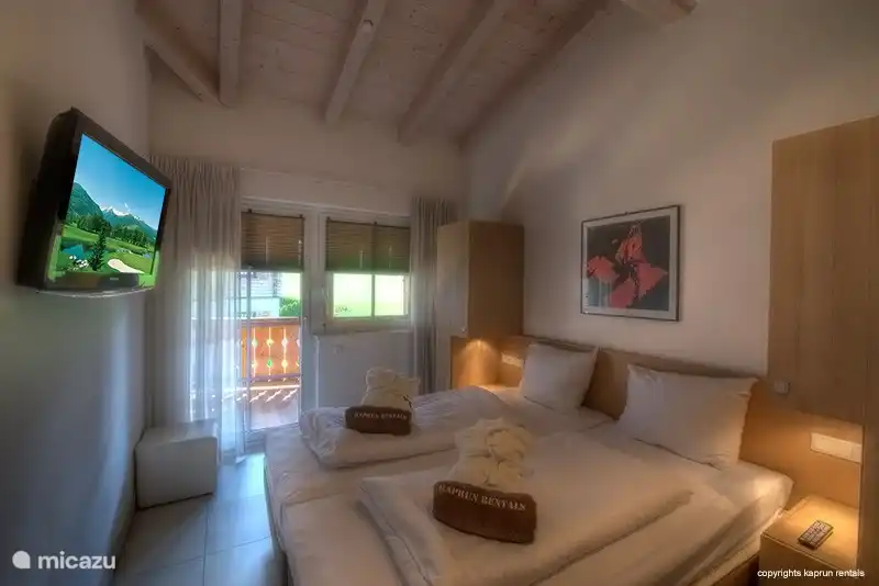 Genießen Sie gemeinsam einen erholsamen Schlaf in Ihrem romantischen Schlafzimmer.