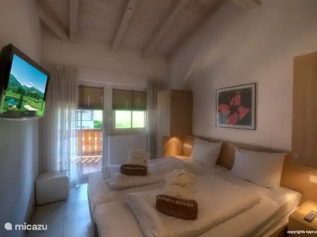 Kaprun Mountain Resort TopE21 | Autriche, Salzburgerland, Kaprun - appartement Profitez ensemble d'une nuit de sommeil bien méritée dans votre chambre romantique.