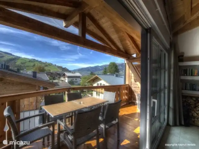 Kaprun Mountain Resort TopA24 huren in Oostenrijk, Salzburgerland, Kaprun - appartement Ga voor een prachtig uitzicht door de mooie, grote schuifdeuren.