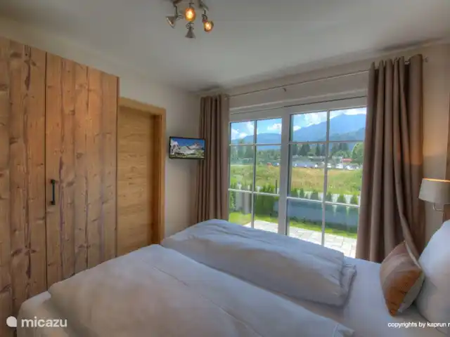 Deer and Dear Luxury Chalet, App. A en Austria, Salzburgo, Piesendorf - apartamento Hermosos dormitorios principales con balcón o acceso directo al jardín