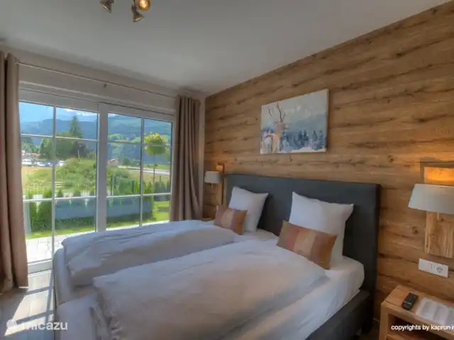 Deer and Dear Luxury Chalet, App. A en Austria, Salzburgo, Piesendorf - apartamento Relájese en las hermosas habitaciones con camas de lujo.