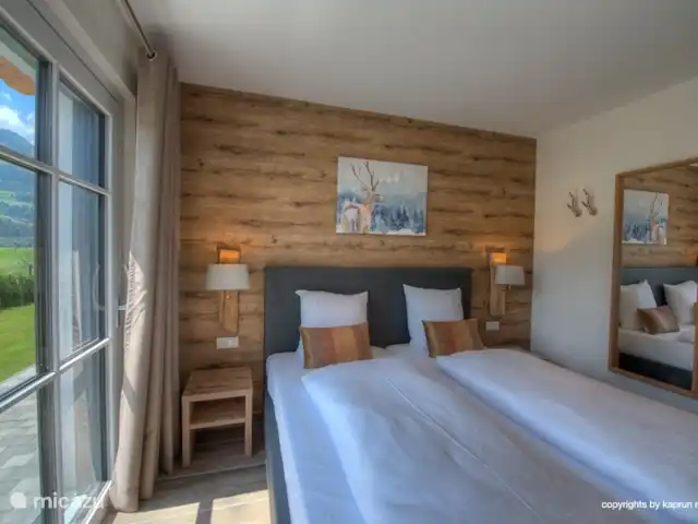 Deer and Dear Luxury Chalet, App. A en Austria, Salzburgo, Piesendorf - apartamento Hermosos dormitorios principales con balcón o acceso directo al jardín
