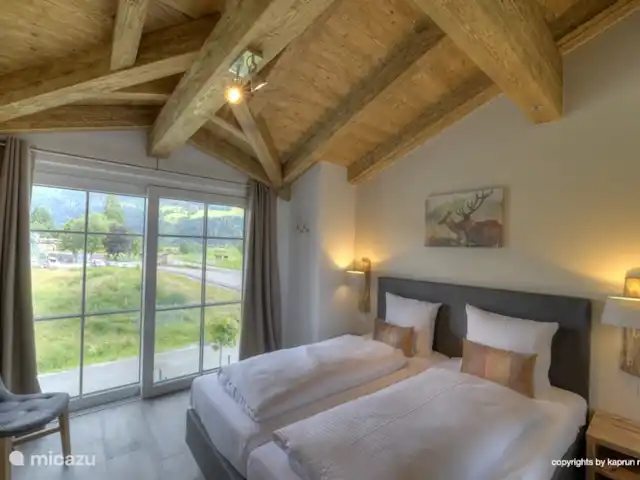 Deer and Dear Luxury Chalet, App. A en Austria, Salzburgo, Piesendorf - apartamento ¡Incluso desde el dormitorio tienes una vista magnífica!