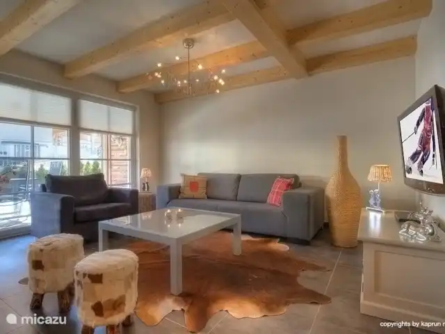 Location de Vacances Autriche, Salzburgerland, Kaprun, appartement - Kaprun Mountain Resort TopC3 C'est merveilleux de rentrer à la maison dans le salon spacieux et confortable, avec beaucoup de lumière du jour.