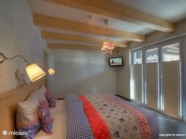 Location de Vacances Autriche, Salzburgerland, Kaprun, appartement - Kaprun Mountain Resort TopC3 Profitez de la nuit dans cette chambre unique. Ouvrez les portes et plongez dans la neige !