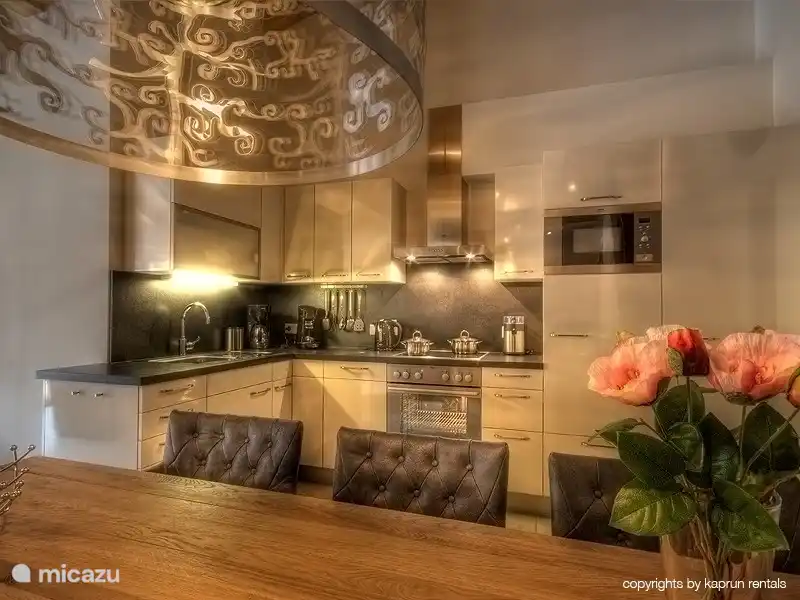 The kitchen and dining area are the perfect place to enjoy the food together.