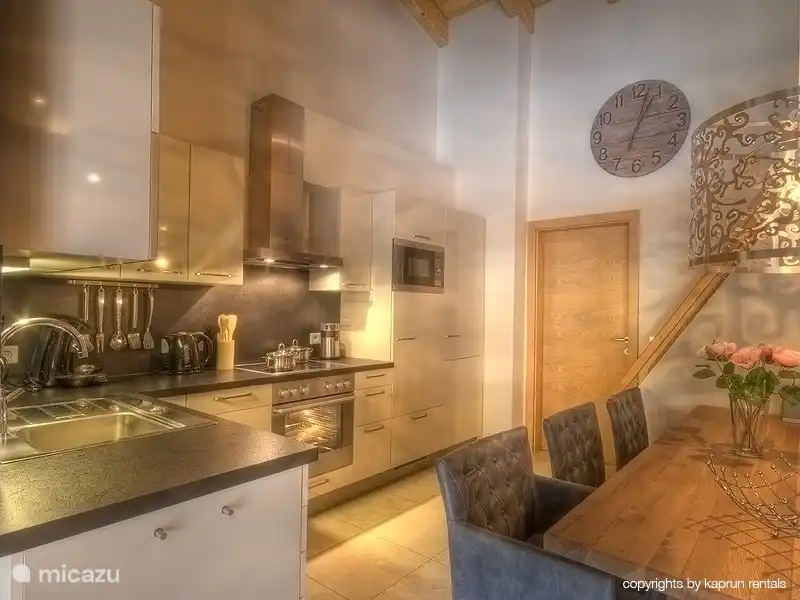 Another look at the beautiful kitchen. The cooking specialist of your company will be happy to make delicious meals here!