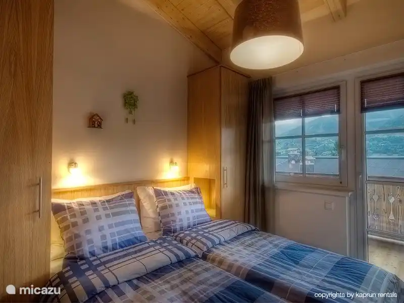 From this bedroom you can easily get to the balcony and enjoy the beautiful view!