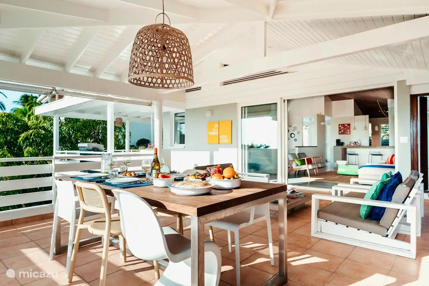 Large porch with porch set, BBQ area and 2 dining tables.