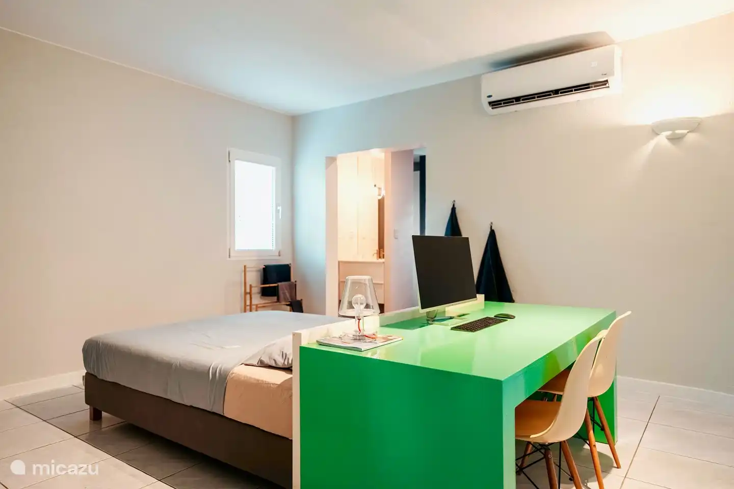 Master bedroom with dedicated desk.