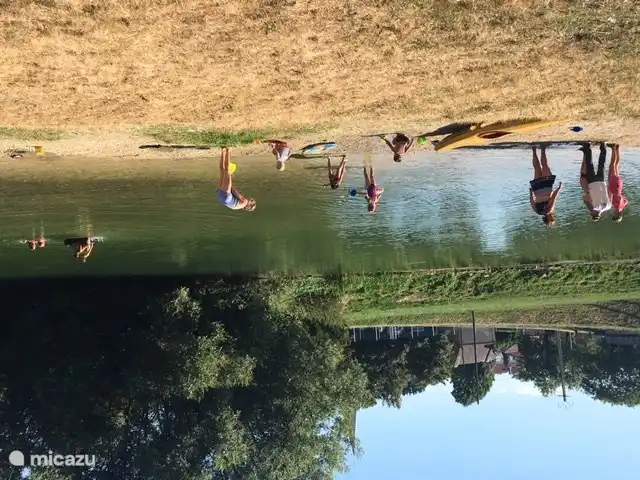 Zwemmen en strandjes aan de rivier