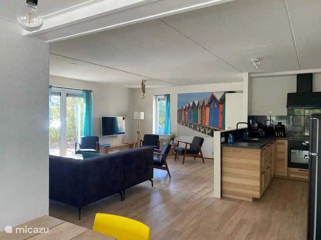 living room with large table for 10 people