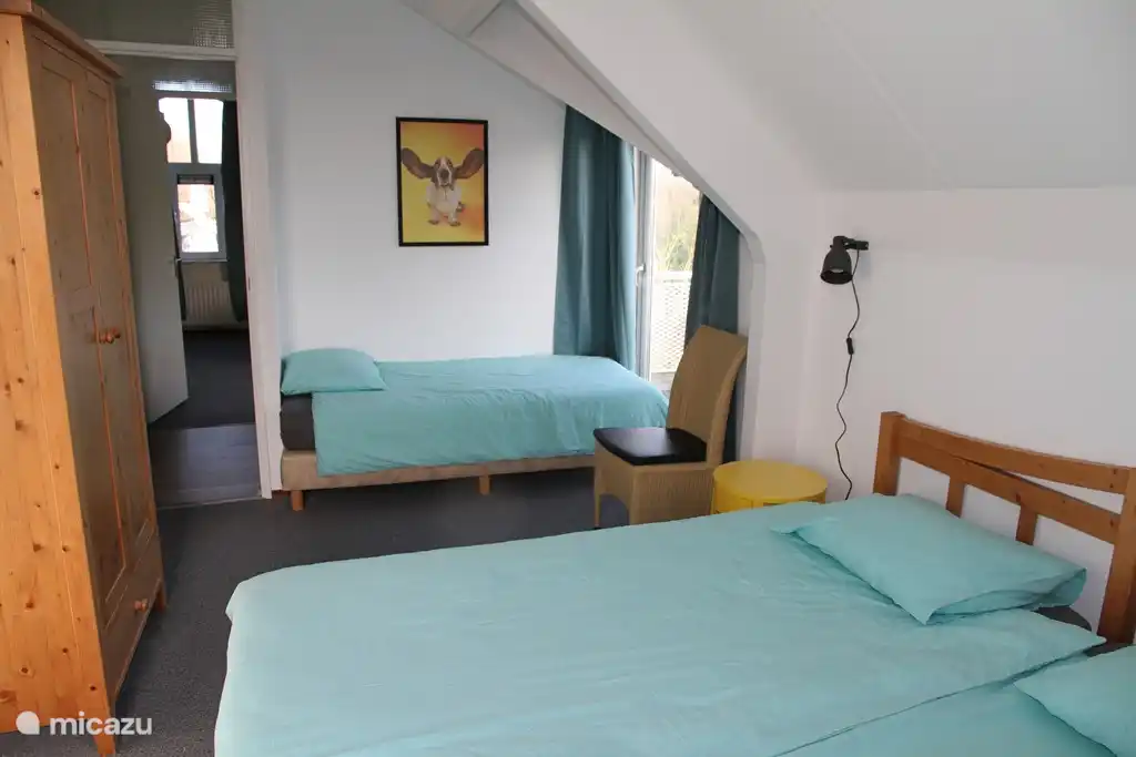 Bedroom with three beds