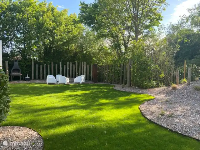Maison zélandaise au bord de la mer | Pays-Bas, Zélande, Kamperland - maison de vacances Auvent avec canapés de salon, cheminée, grand jardin