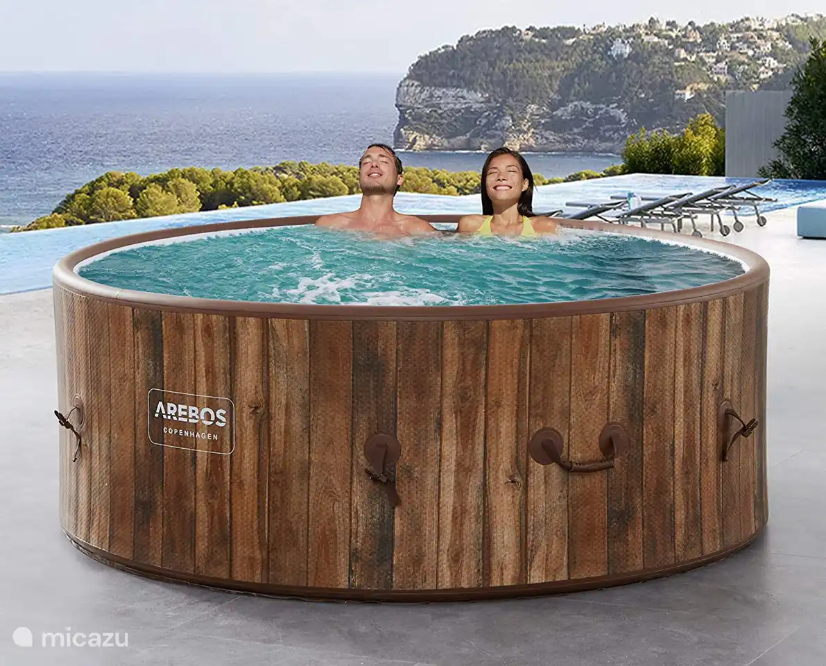 This is a stock photo of our new Jacuzzi/Hot Tub for six people. It is next to the swimming pool and is shielded. He looks out on the infinite view. We turn it into a nice place where you can also enjoy a drink. 