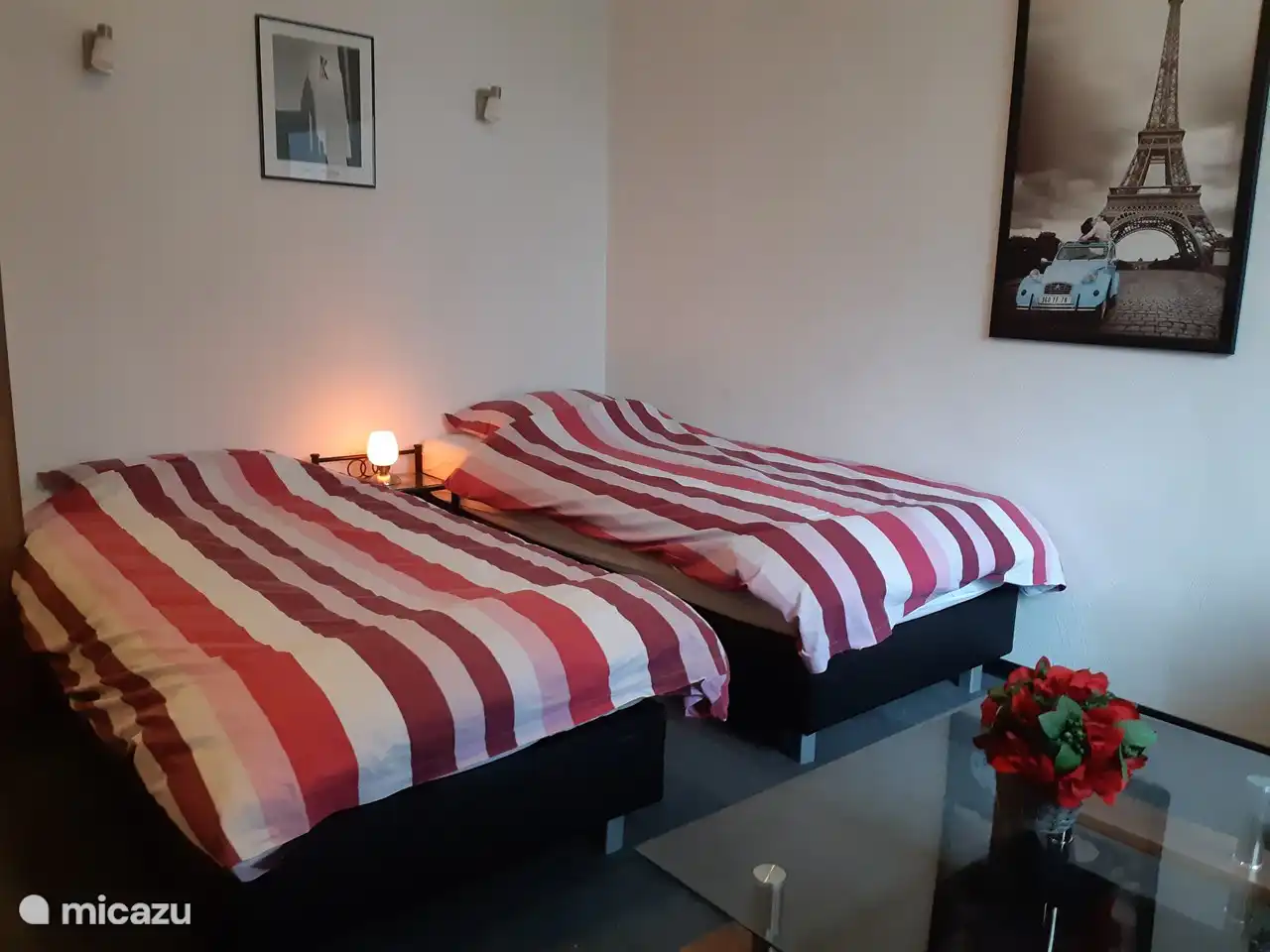 Renovated studio with box spring beds.