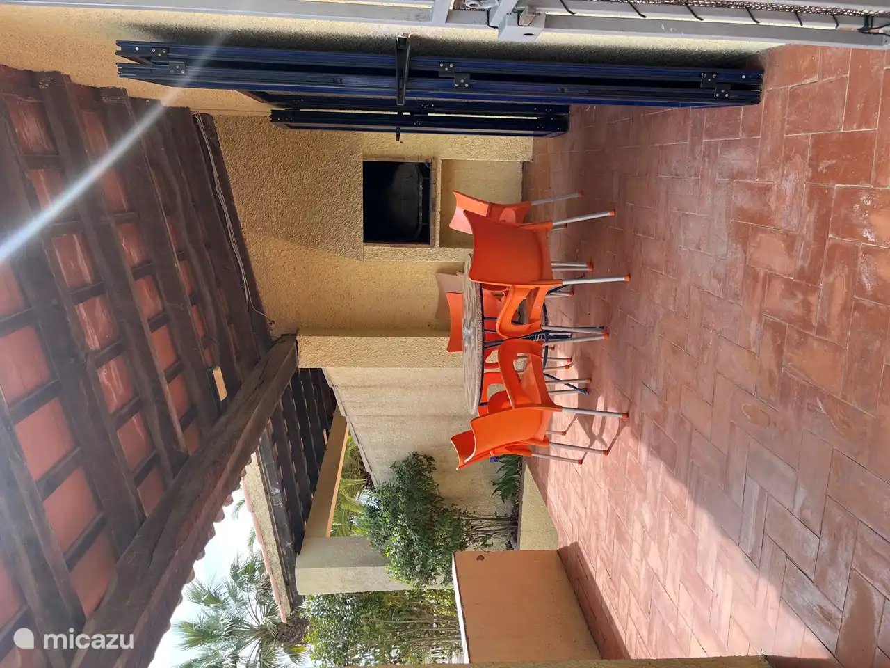 The cozy veranda with BBQ