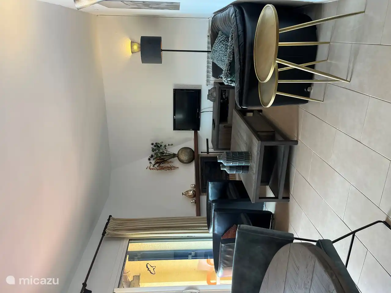 The cozy sitting area with TV