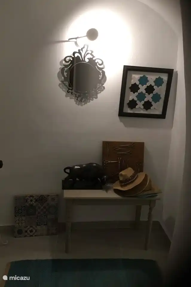 Hall continu entre le coin salon et la chambre trois