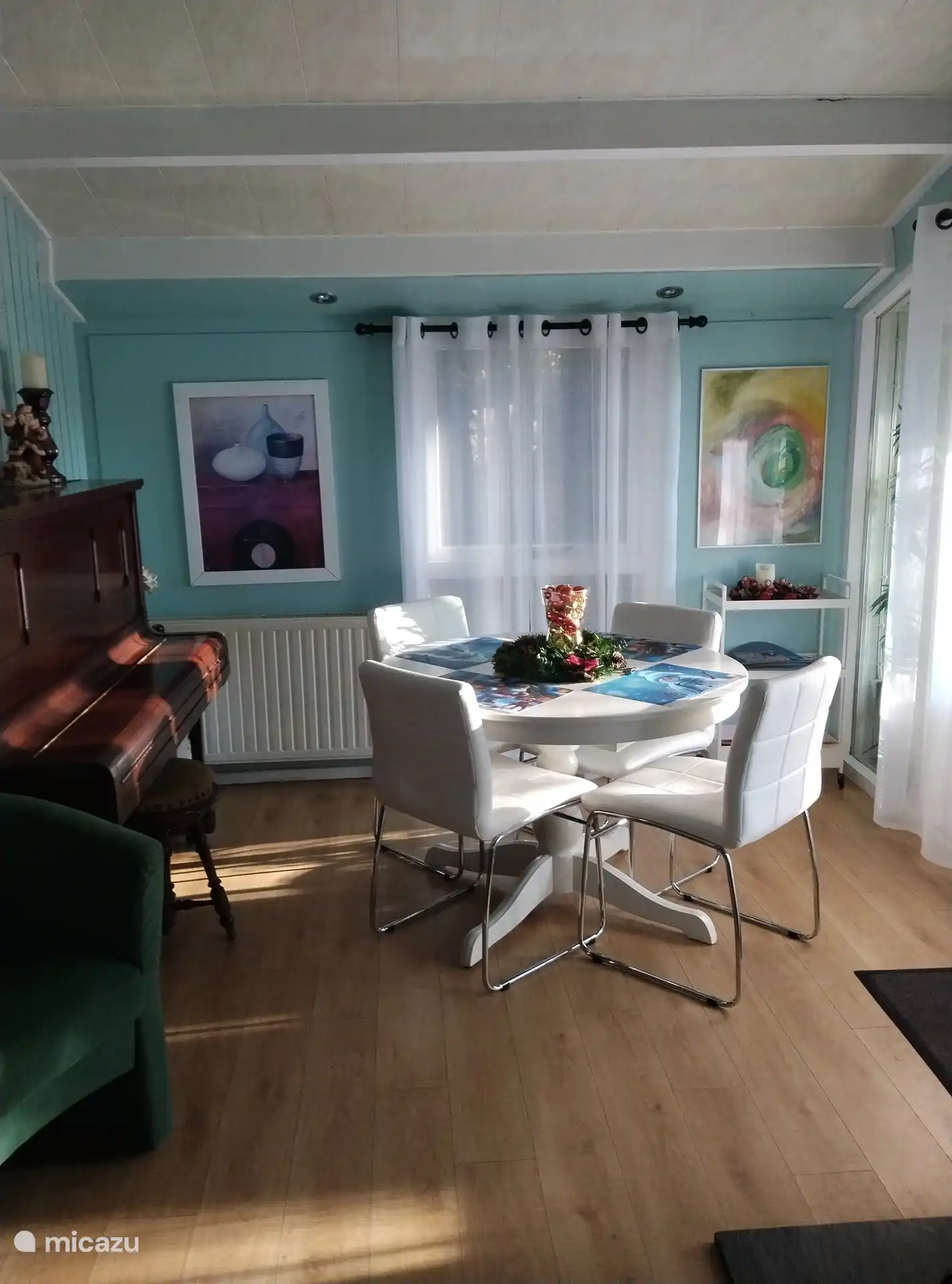 dining area and piano. extendable table
