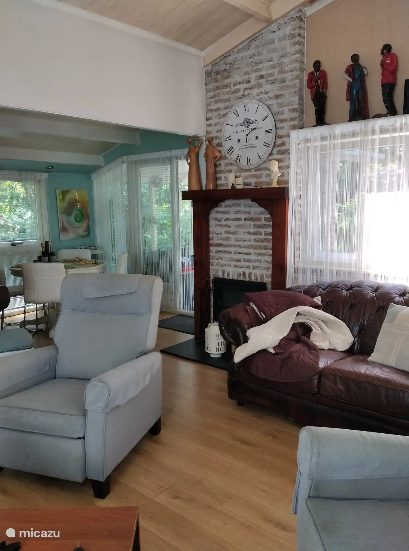fireplace with view of dining area