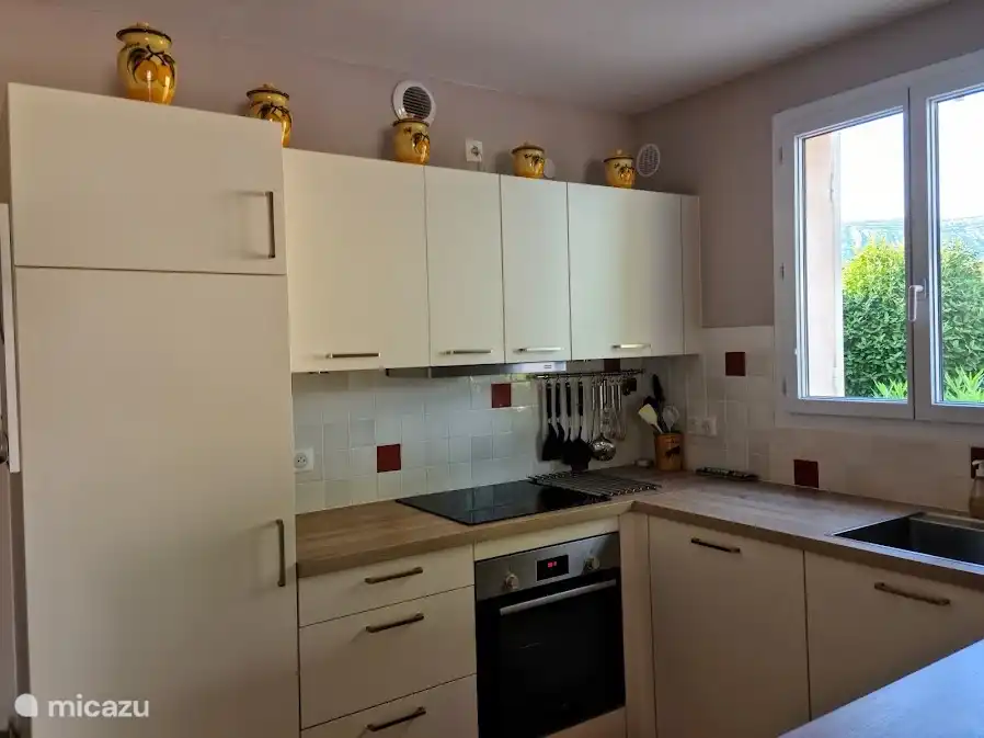 Kitchen with induction plate