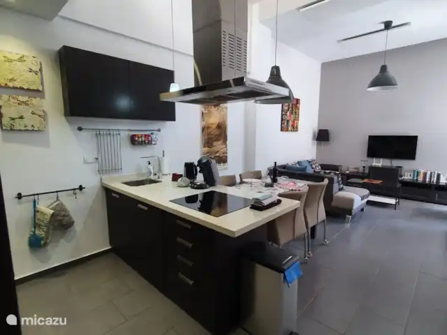 casa vacacional en España, Costa Blanca, Orihuela Costa – Golfo y Mar La sala de estar seguida de la cocina