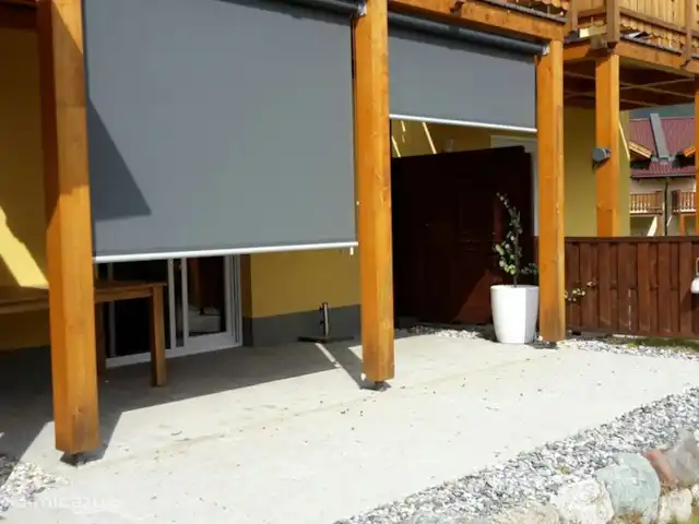 Villa Sonnata huren in Oostenrijk, Karinthië, Kötschach-Mauthen - geschakelde woning Om met het eten uit de zon te zitten en 's avonds nog langer buiten te kunnen blijven, hebben wij een zonnescherm aan laten brengen.