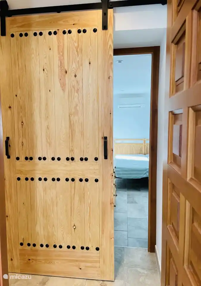 Ground floor corridor between bedrooms and to bathroom