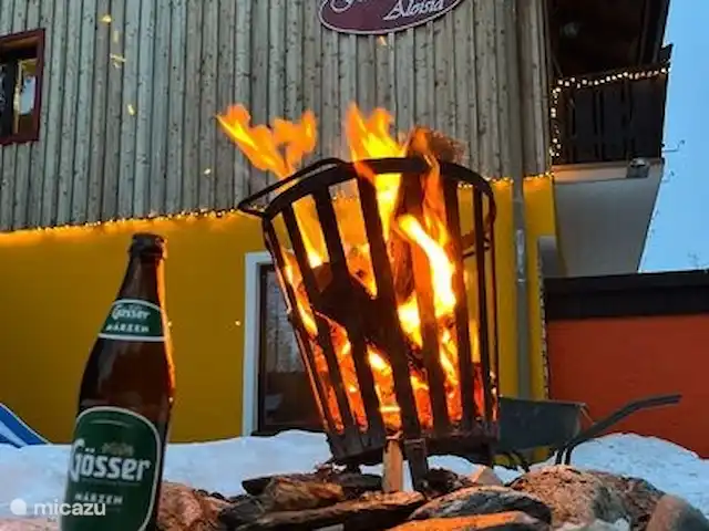 appartement huren in Oostenrijk, Salzburgerland, Sankt Michael Im Lungau – Aloisia - Appartement Tschaneck Tuin met vuurkorf, grill en speeltoestellen.