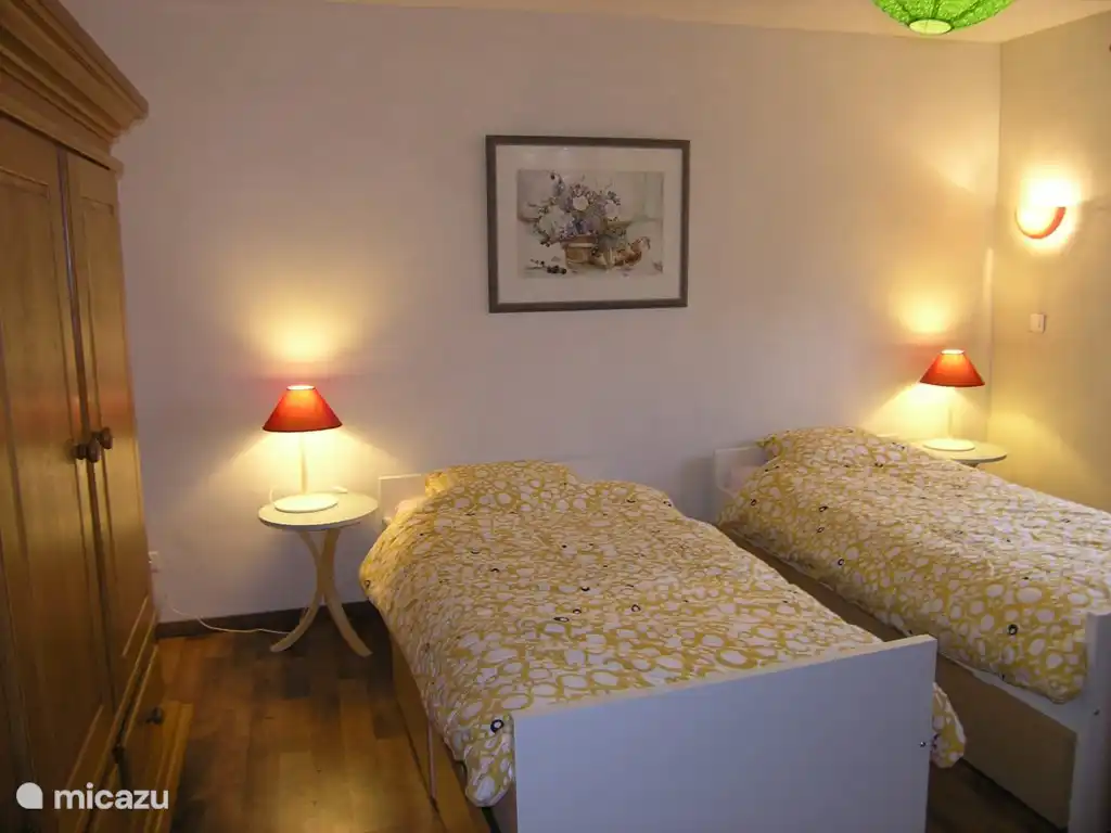 Second bedroom with single bed and cot