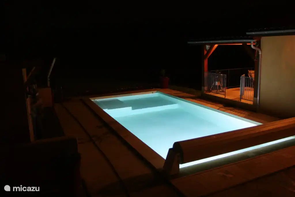 pool lit up for the evening