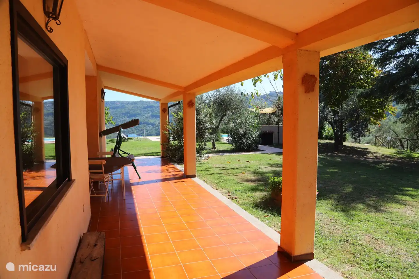 Covered gallery with terrace on the south side