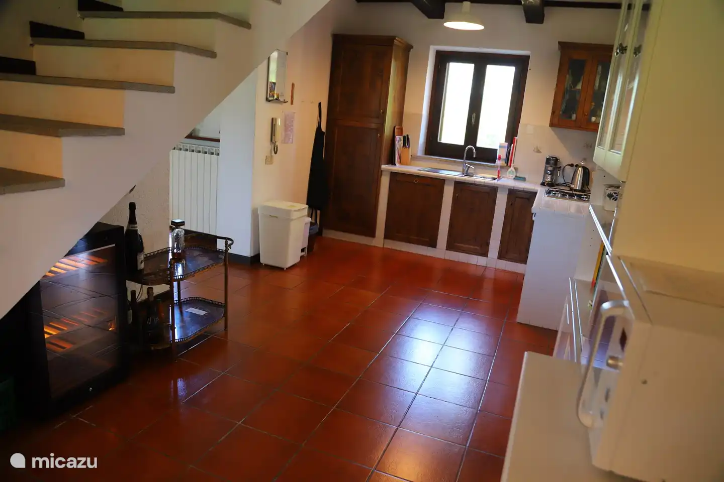 Fully equipped kitchen with wine refrigerator