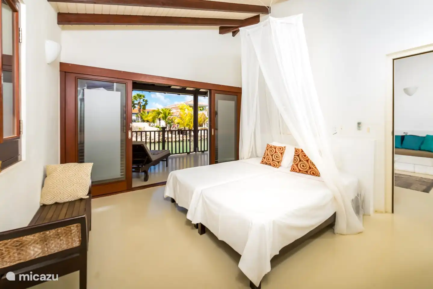 The second bedroom that can also be arranged for three people. Here too we have doors to the terrace.