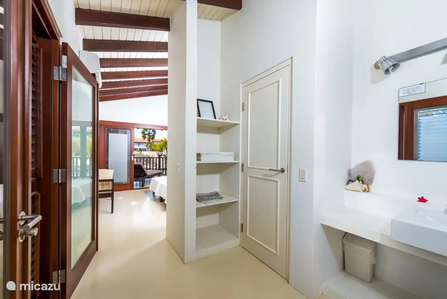 A glimpse from the bathroom of the second bedroom