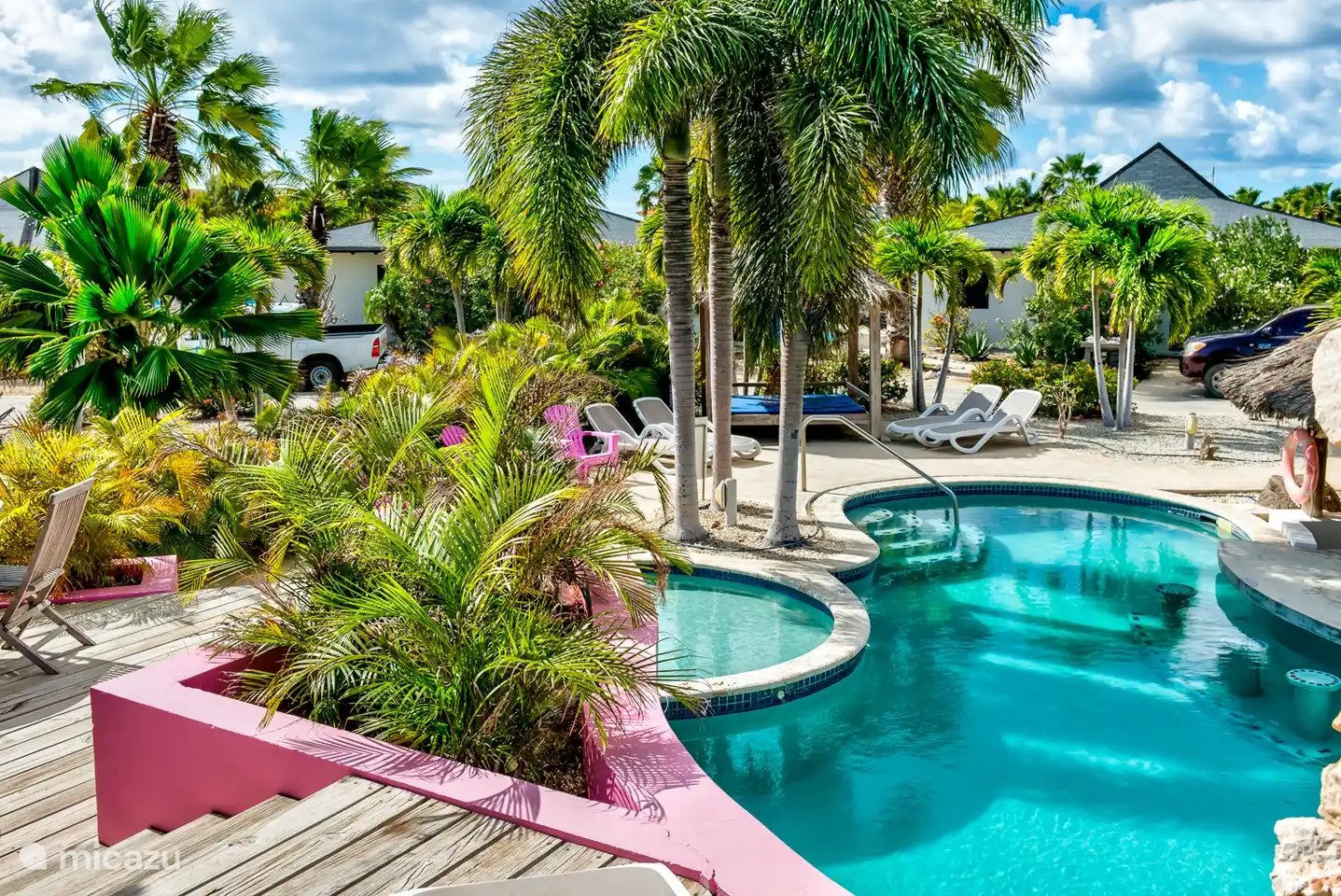 A view from the pool to the villa